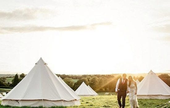 Stonor Park Accommodation Blue Bell Tents Couple Walking